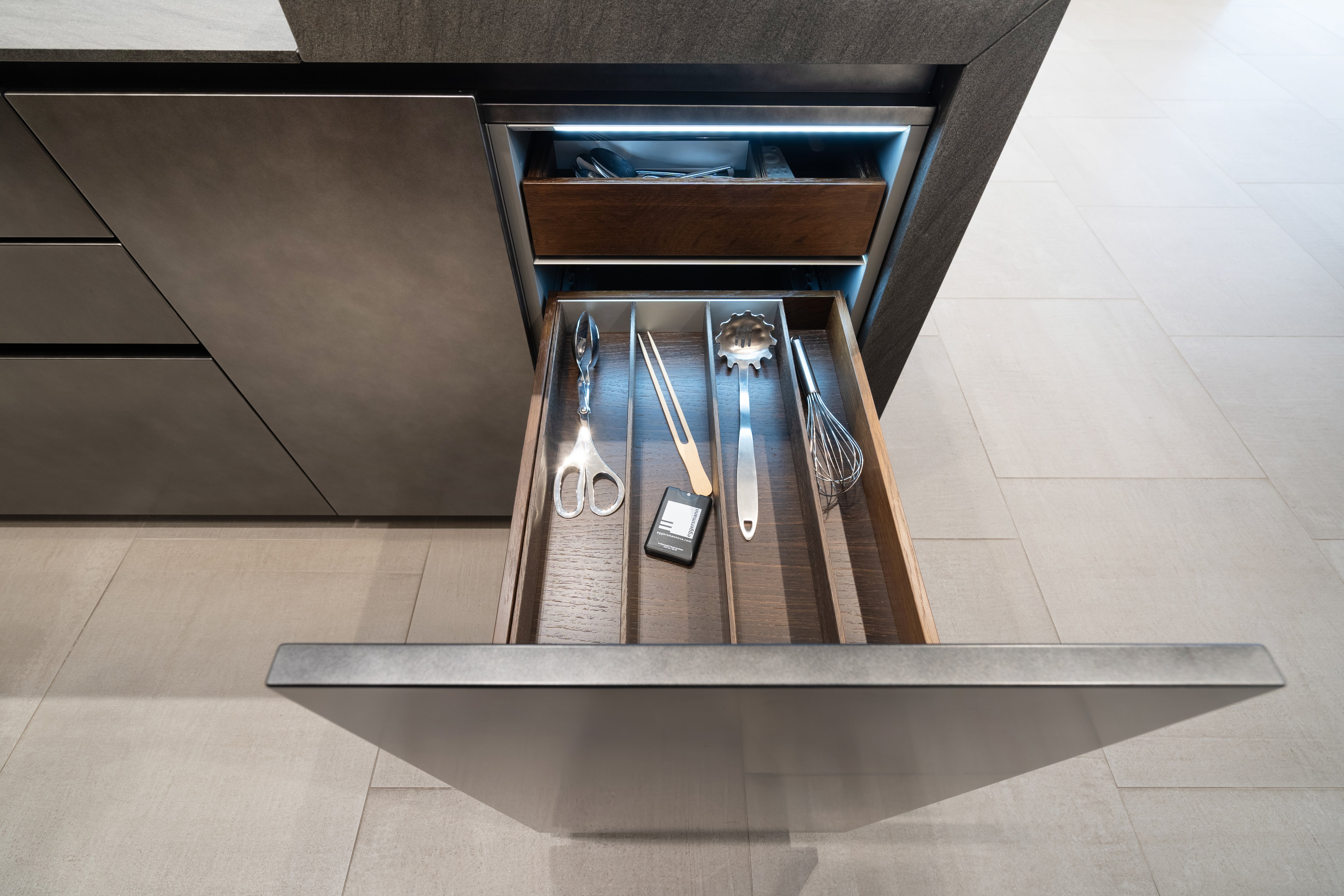 eggersmann Glance Glass and Carbono Stone Island Modern Smoked Oak Kitchen with Gaggenau Appliances