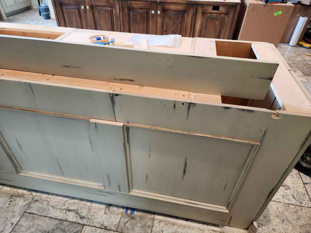 Custom Traditional Distressed Two-Tone Kitchen with Double Island, Stone Countertops and Sub-Zero & Wolf Appliances