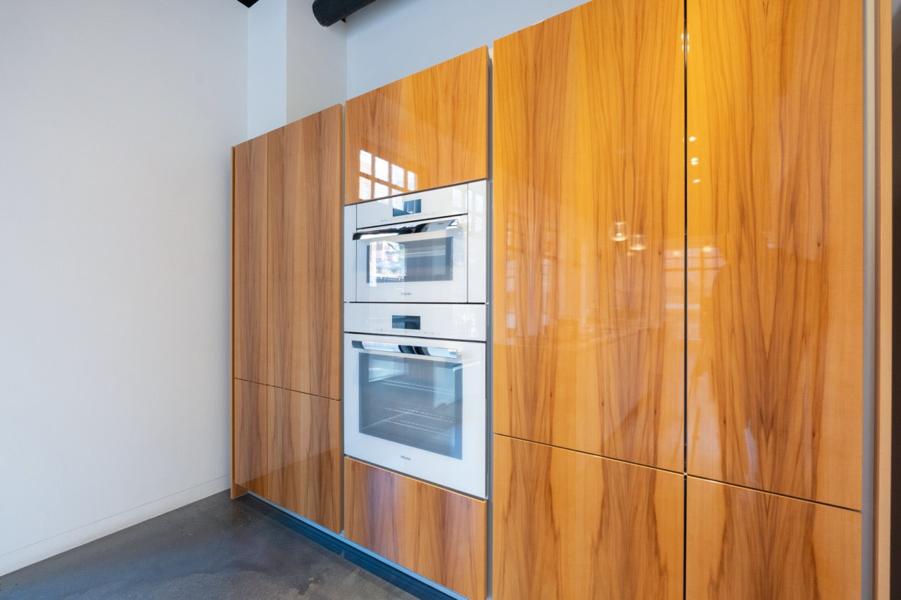 Poggenpohl Segmento Modern White & Wood Veneer Kitchen with Miele Appliance Suite