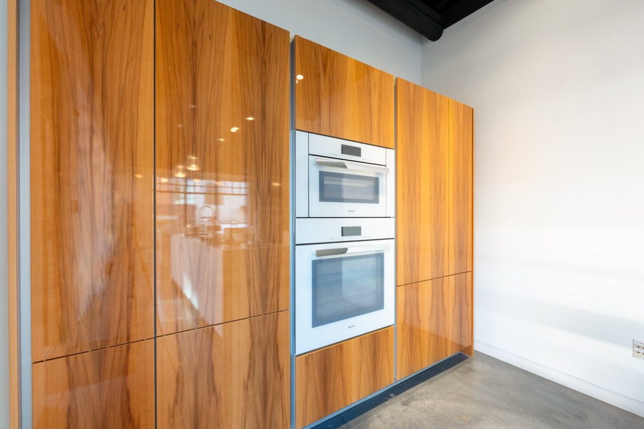 Poggenpohl Segmento Modern White & Wood Veneer Kitchen with Miele Appliance Suite