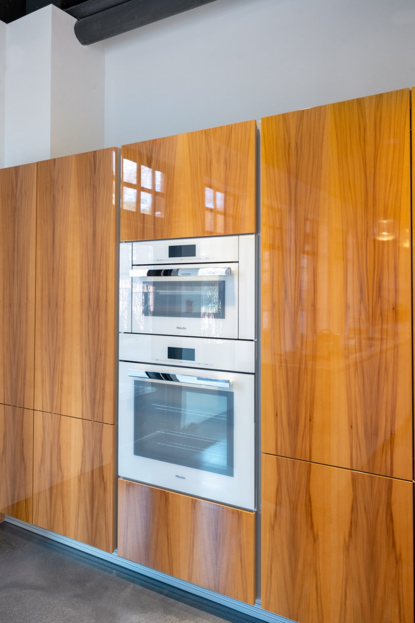 Poggenpohl Segmento Modern White & Wood Veneer Kitchen with Miele Appliance Suite