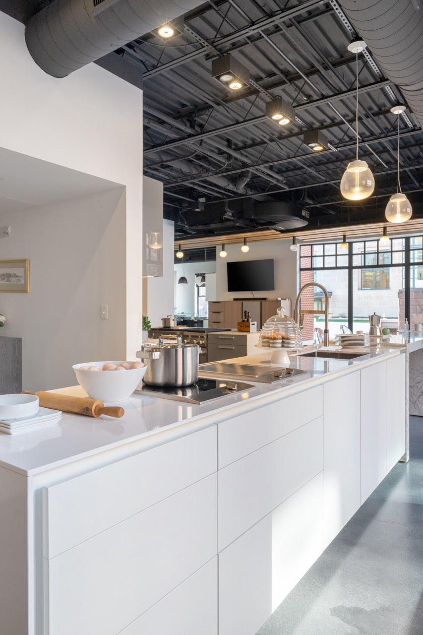 Poggenpohl Segmento Modern White & Wood Veneer Kitchen with Miele Appliance Suite