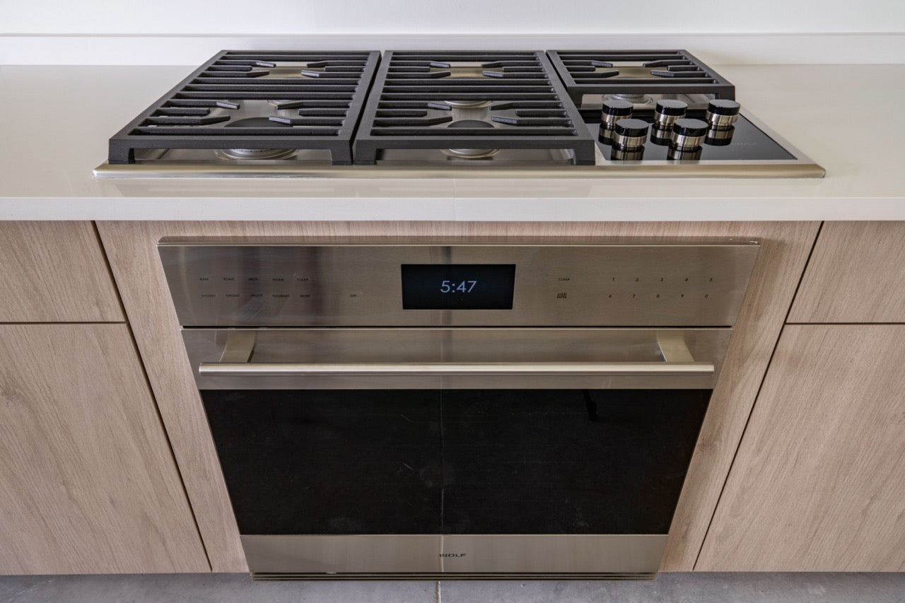 Cabico Sandy Oak Transitional Kitchen with Island & Wolf Appliances