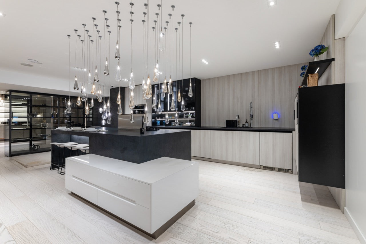Luxury Spanish engineered handleless matte black and wood modular kitchen suite by DOC