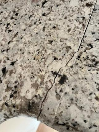 Custom Traditional Cream Kitchen with Island, Granite Countertops and 48" Range