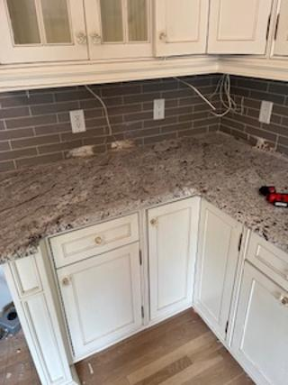 Custom Traditional Cream Kitchen with Island, Granite Countertops and 48" Range