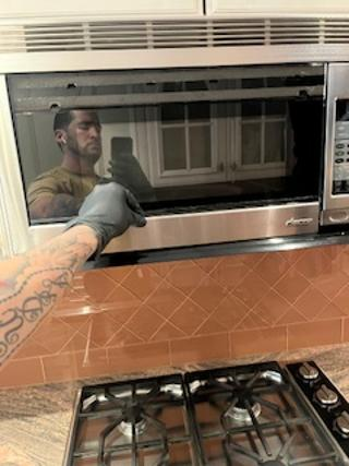 Wood-Mode Wonder: Traditional Light Cream Kitchen with Granite Countertops