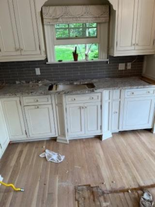 Custom Traditional Cream Kitchen with Island, Granite Countertops and 48" Range