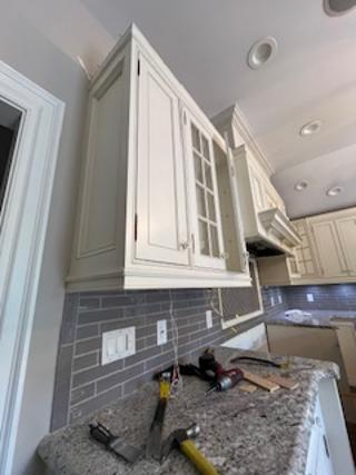Custom Traditional Cream Kitchen with Island, Granite Countertops and 48" Range