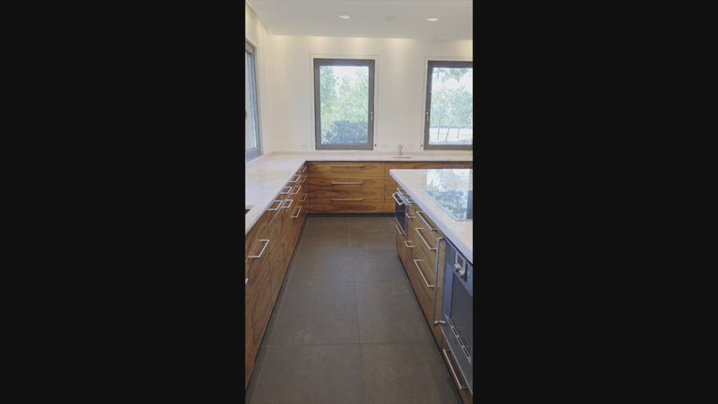 Custom Modern Kitchen with Marble Countertops and Gaggenau Appliances