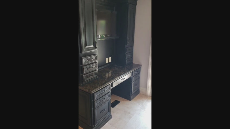 Luxury natural hardwood kitchen layout showing integrated desk office area and matching center island