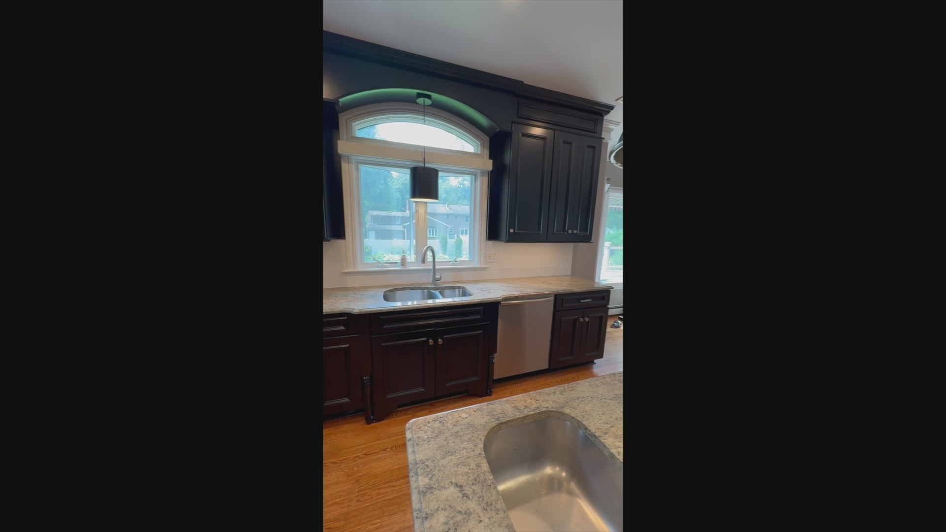 Load video: Luxury custom jet black kitchen cabinetry with professional appliances