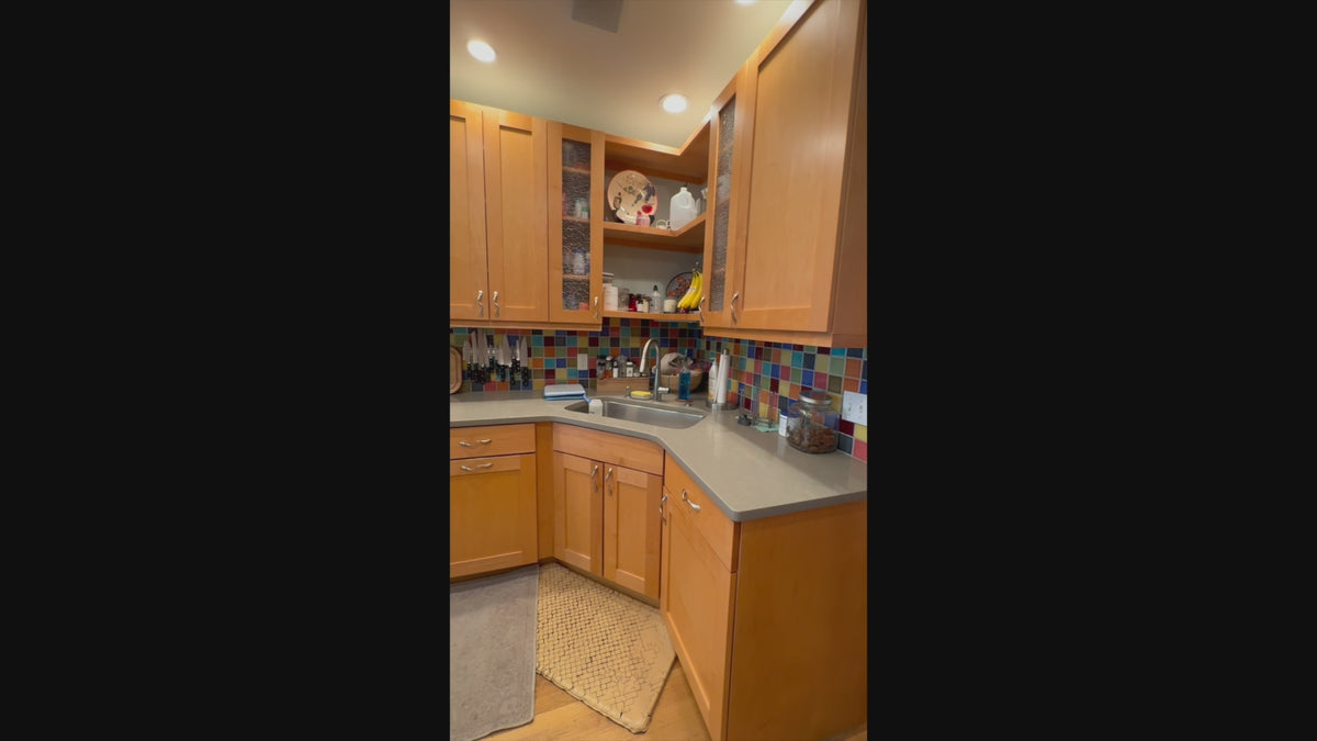Load video: High-end showroom display complete kitchen package in transitional shaker style