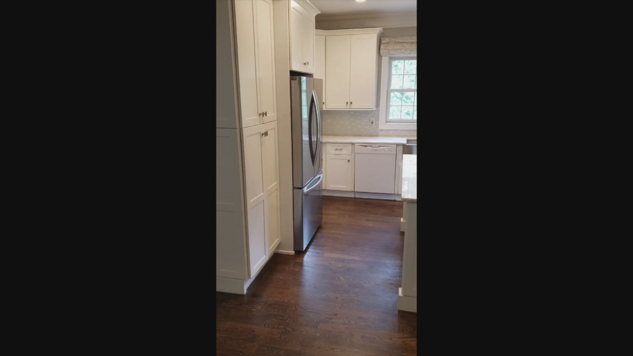 Load video: Fabuwood Transitional White Kitchen with Island and White Marble Countertops