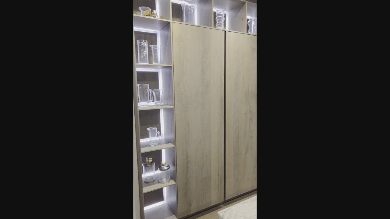 Load video: eggersmann USA Chablis Vintage Oak &amp; Steel Grey Modern Kitchen with Arabescato Waterfall Island and Miele Appliance Suite