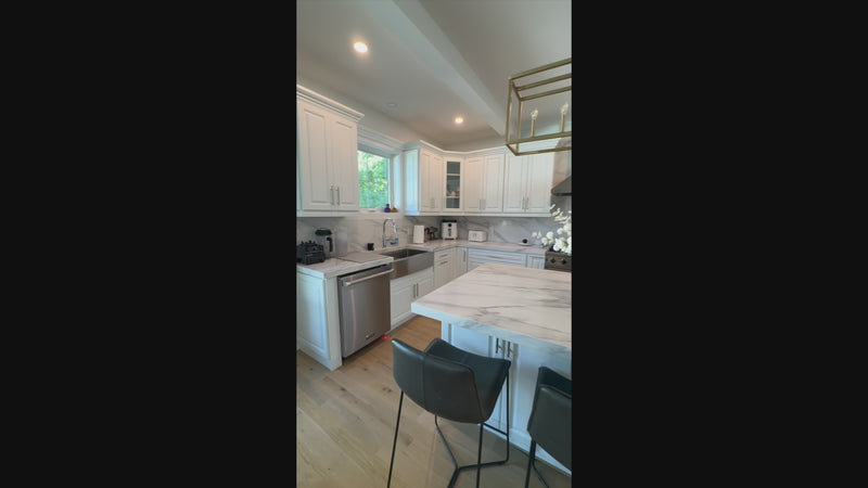 Cubitac transitional white custom kitchen suite with center island and Viking appliances