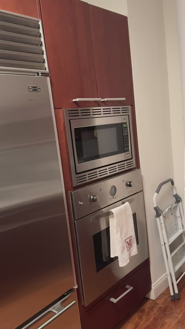 Poggenpohl Brown Toned Transitional Kitchen with Marble Countertops and Appliances