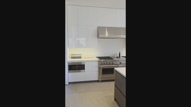 Custom Modern White Gloss Kitchen with Island, Stone Countertops and 60" Wolf Range