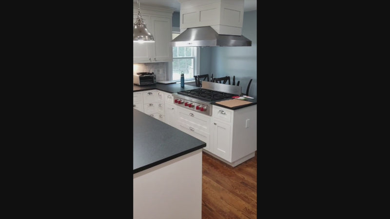 Custom Traditional White Kitchen with Stone Countertops and Appliances