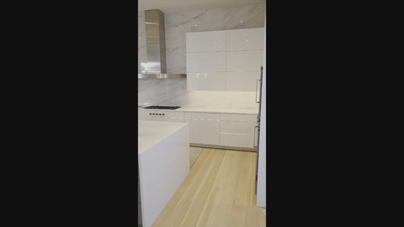 Brubaker Modern White Lacquered Kitchen with Waterfall Island and Stone Countertops