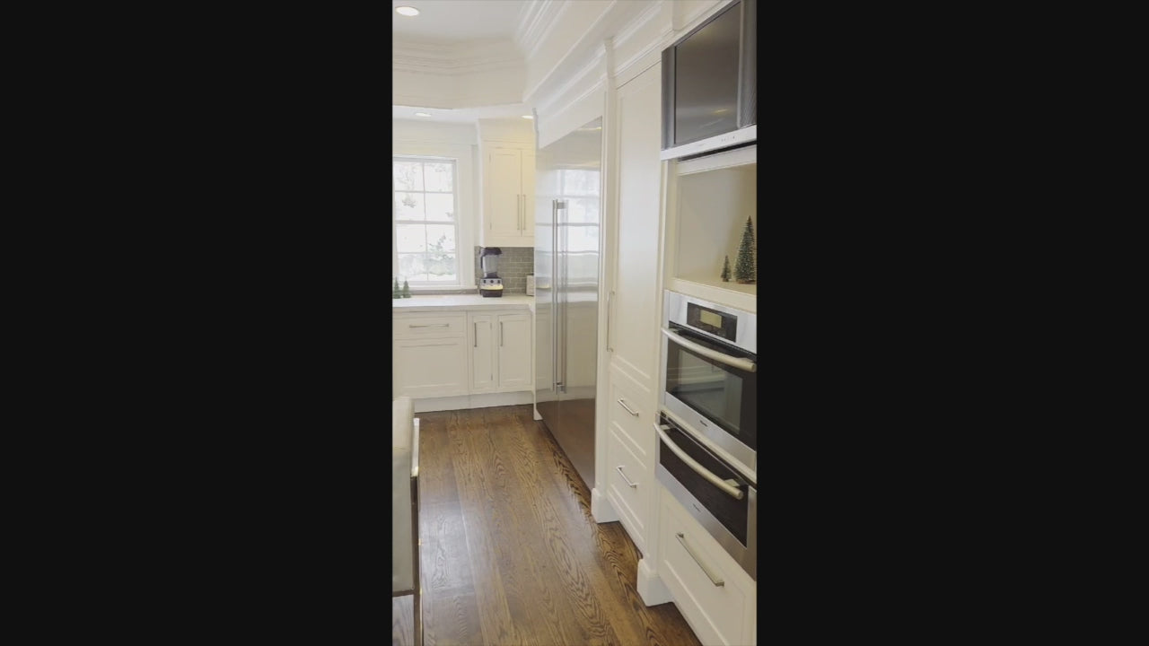 Load video: “The Clarendon” Transitional White &amp; Grey Kitchen with Island and Wolf Appliances