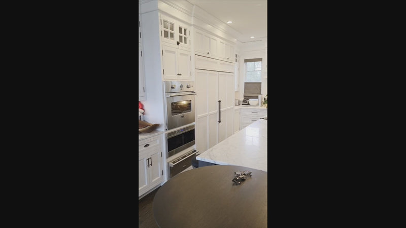 "The Prescott" transitional white kitchen with large island and Viking appliances