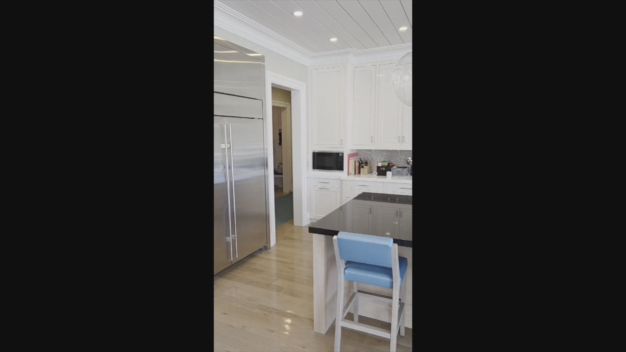 Load video: Custom Transitional White Kitchen with Natural Wood Toned Island, Quartz and Granite Countertops, 60&quot; Wolf Range and Appliances
