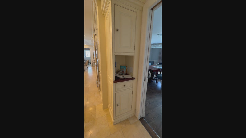 Luxury European custom cream kitchen cabinetry with classic French detailing