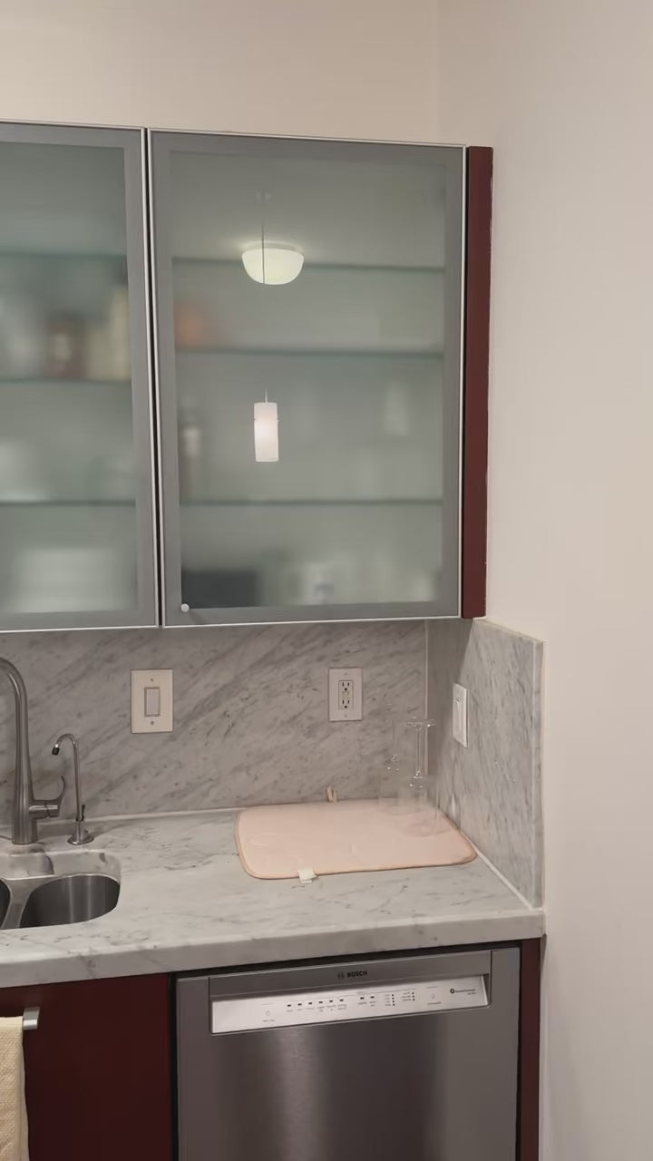 Poggenpohl Brown Toned Transitional Kitchen with Marble Countertops and Appliances