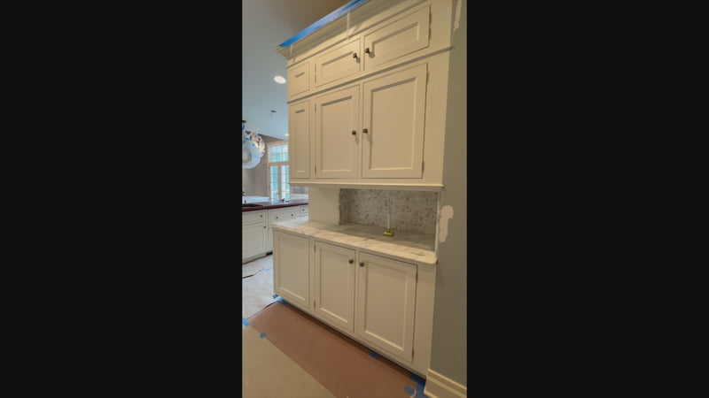 The Clair transitional white solid wood kitchen cabinets with matching island