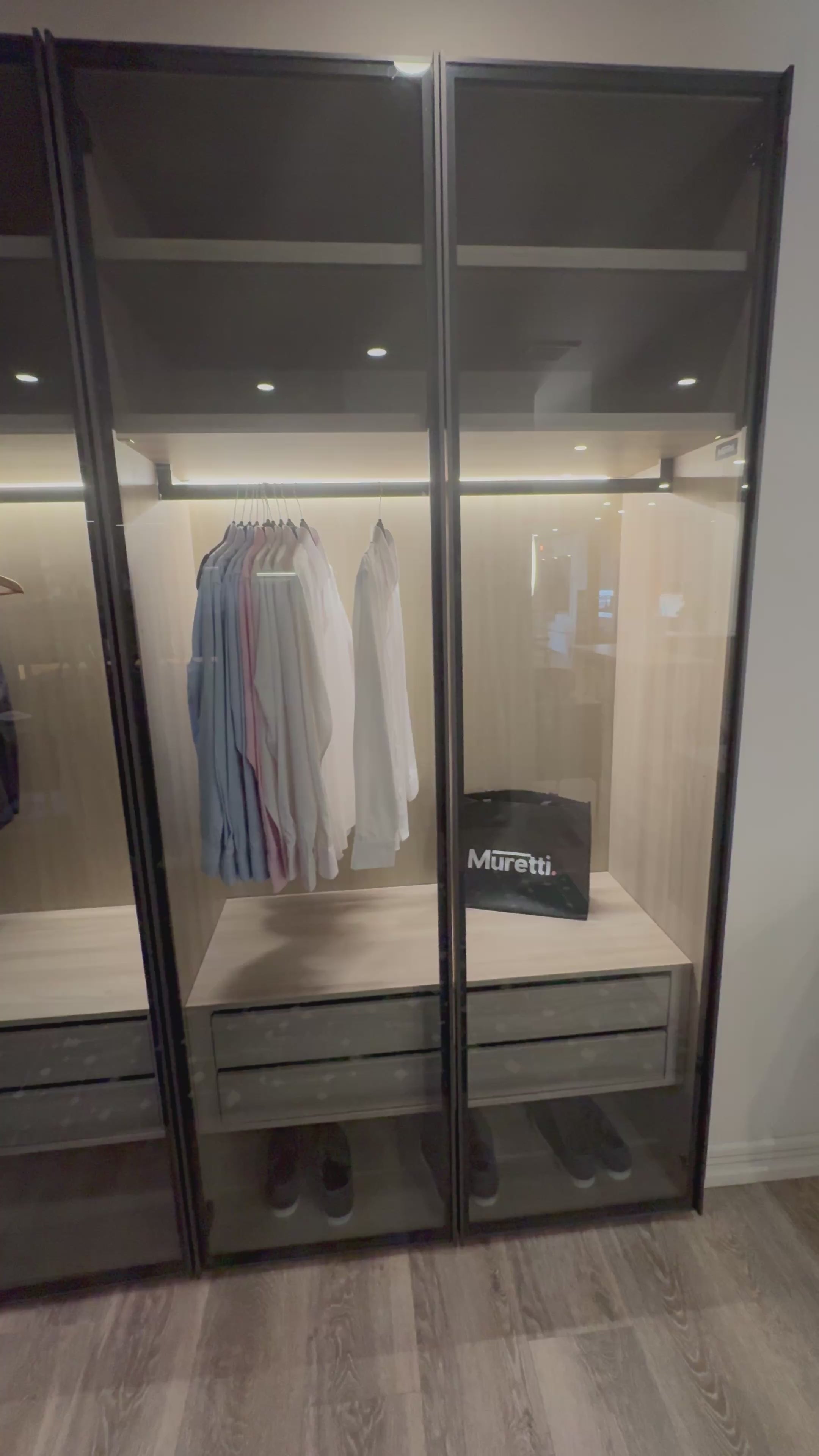 Load video: Muretti Modern Aluminum Framed Showroom Display Built-In Wardrobe Closet System
