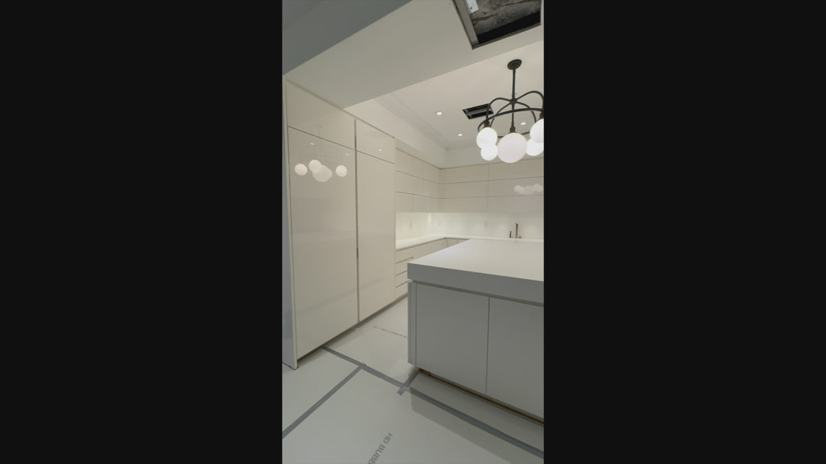 Load video: Poliform modern glossy white kitchen cabinets with island and Miele appliances