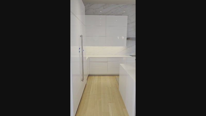 Brubaker Modern White Lacquered Kitchen with Waterfall Island and Stone Countertops