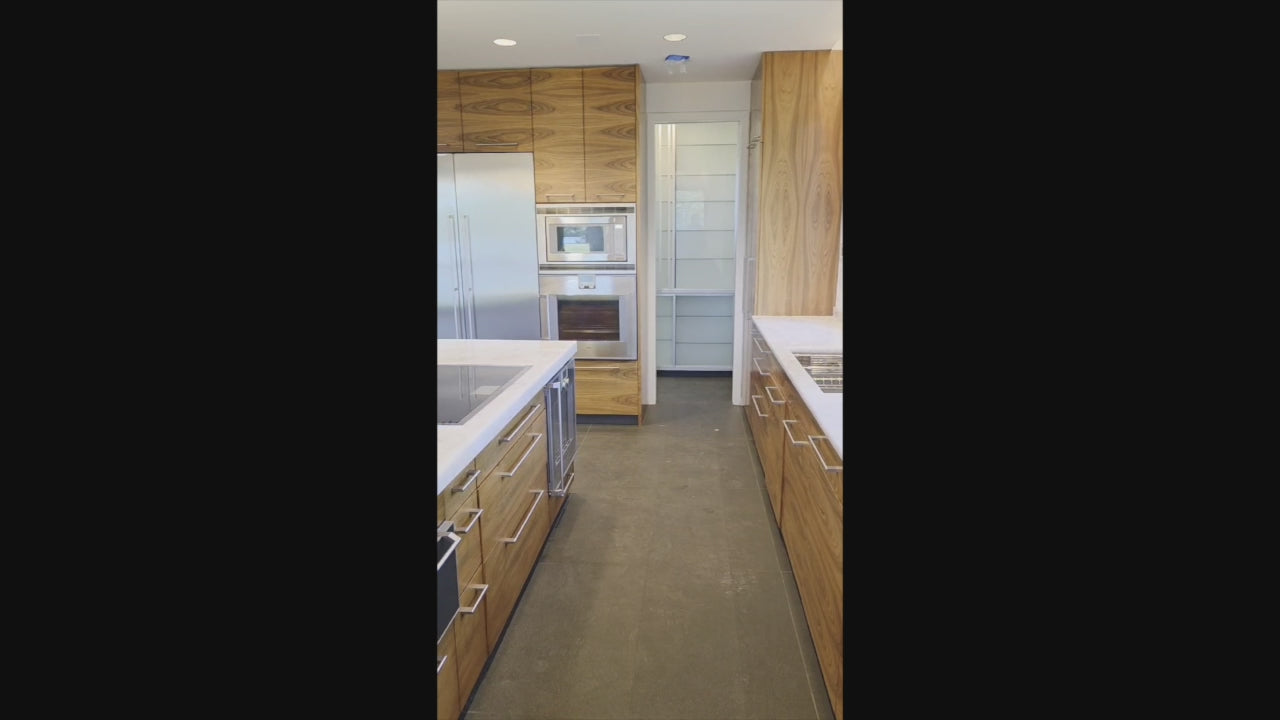 Load video: Custom Modern Kitchen with Marble Countertops and Gaggenau Appliances