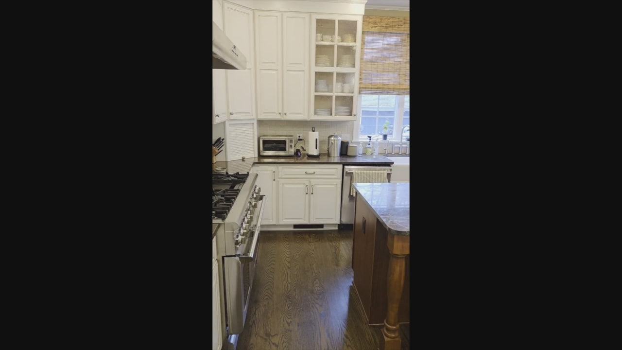 Load video: Luxury wooden kitchen island with distressed cabinetry and desk area