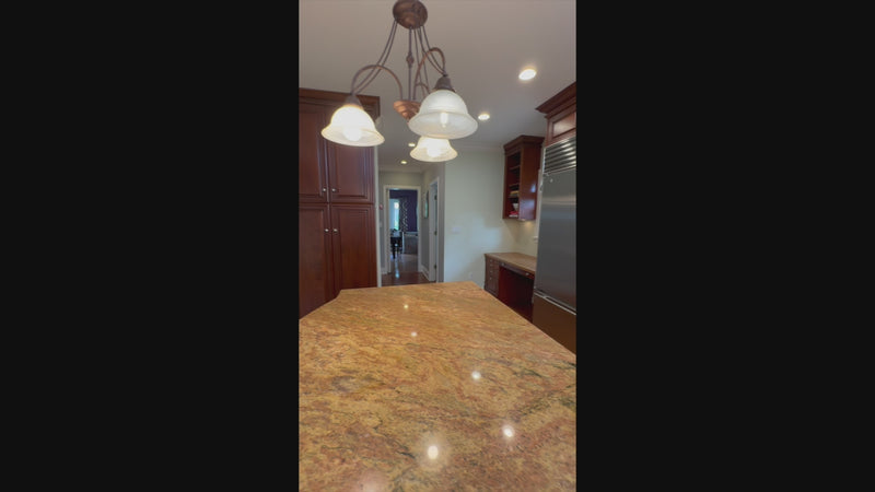 View of Brookhaven kitchen island and integrated luxury appliance suite