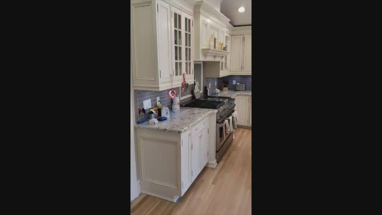 Load video: Custom Traditional Cream Kitchen with Island, Granite Countertops and 48&quot; Range