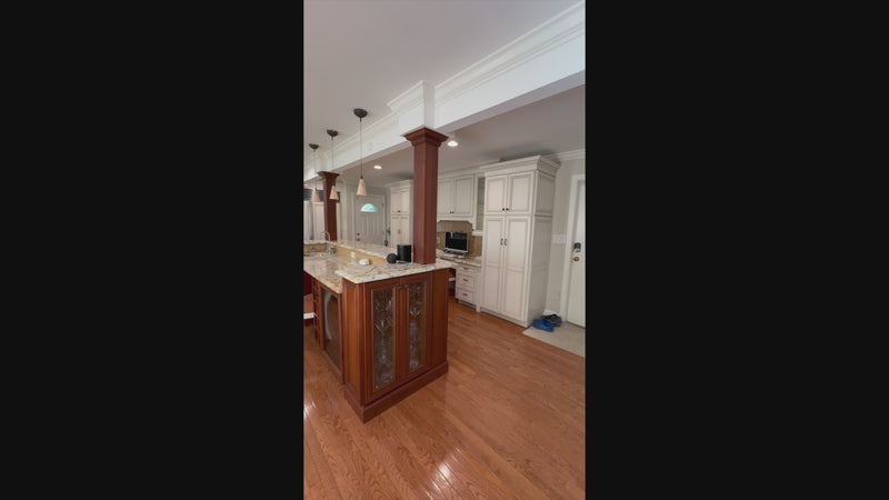 The Chester traditional white kitchen with central island and built-in desk area