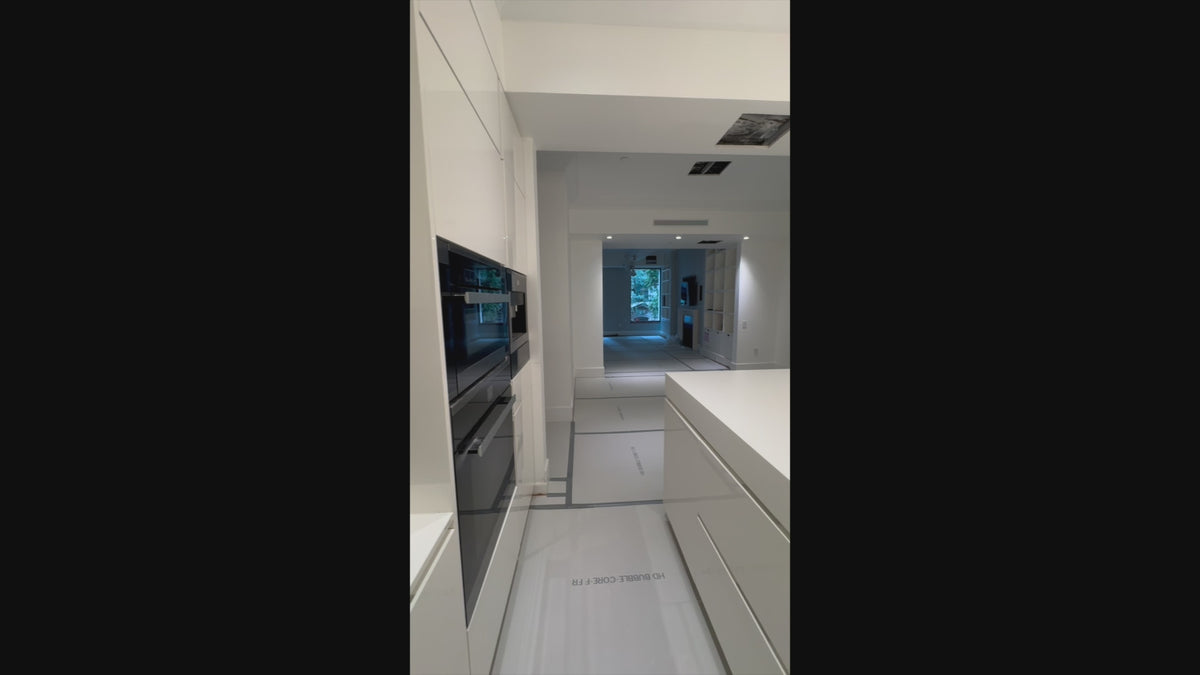 Load video: High-end residential custom millwork cabinetry in contemporary white gloss