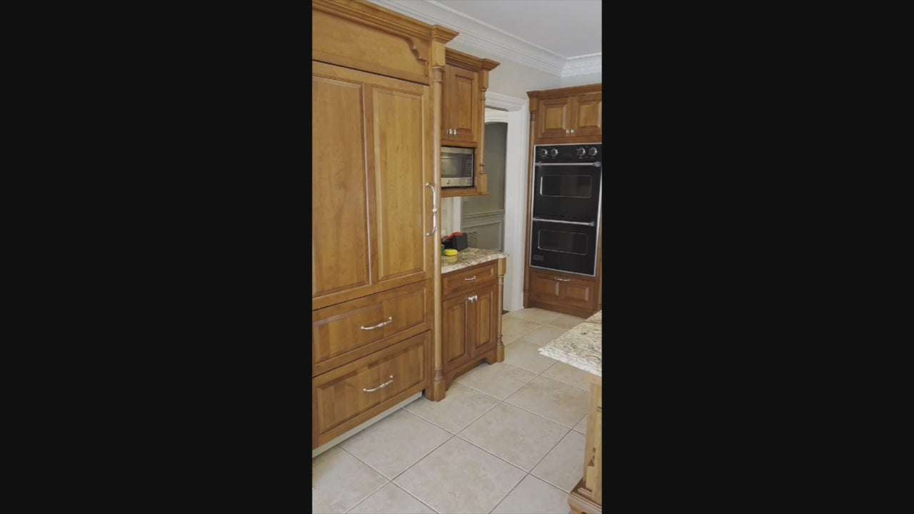 Load video: “The Woodford” Traditional Custom Wooden Kitchen with Island, Wolf Rangetop &amp; Sub-Zero Refrigerator