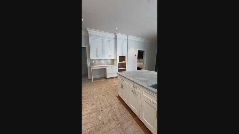 High-end architectural residential kitchen cabinetry in classic white finish