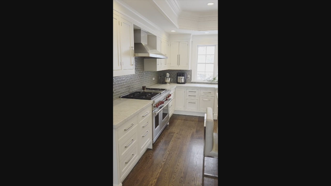 Load video: “The Clarendon” Transitional White &amp; Grey Kitchen with Island and Wolf Appliances