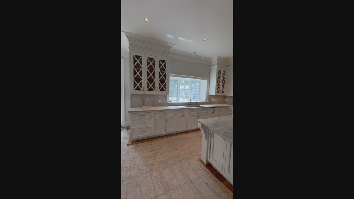 Load video: Luxury custom white kitchen suite with integrated professional refrigeration