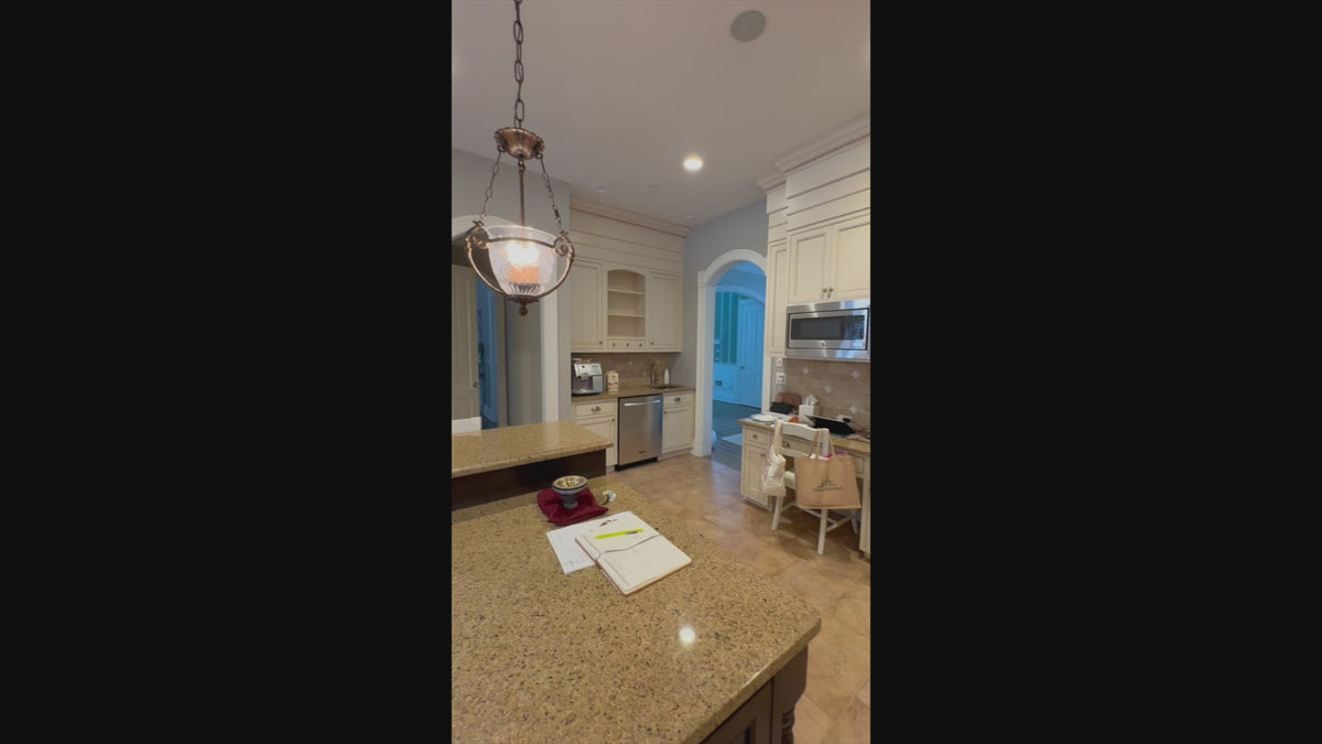 Load video: Luxury showroom display dual tone kitchen layout with white perimeter and dark island