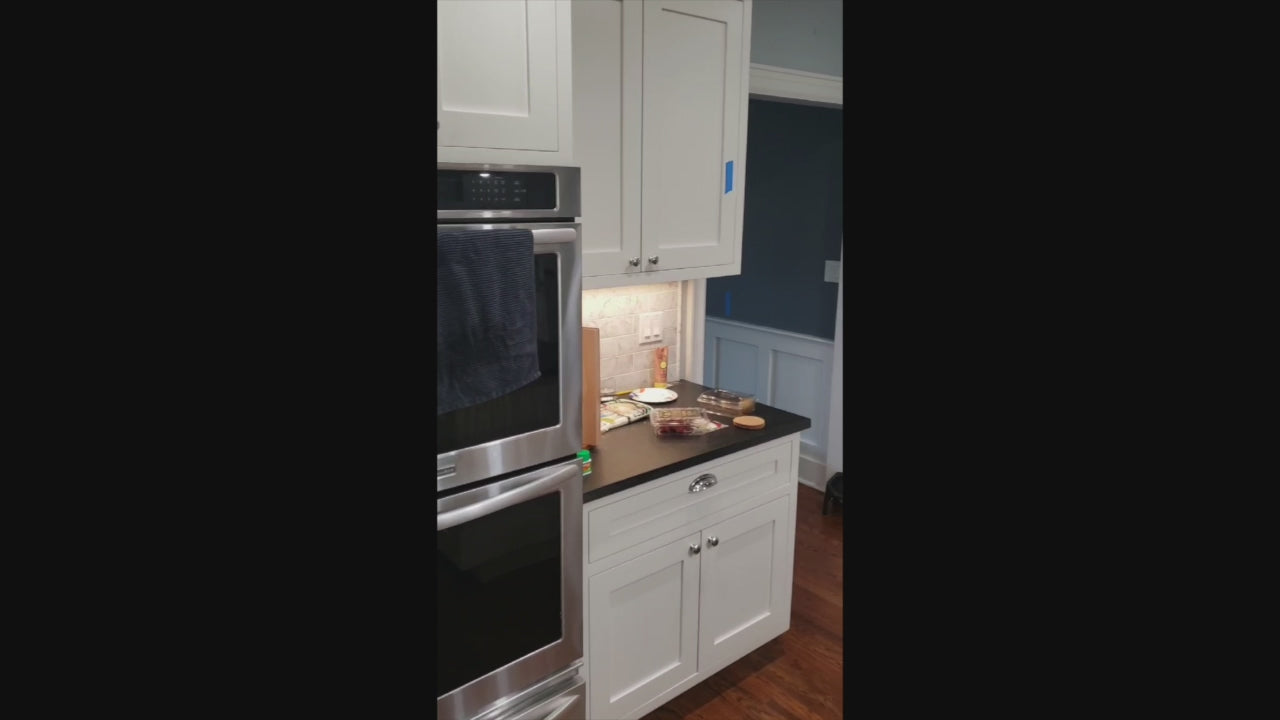 Load video: Custom Traditional White Kitchen with Stone Countertops and Appliances